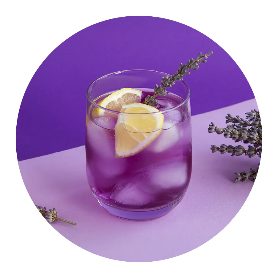 purple alcoholic beverage on purple background