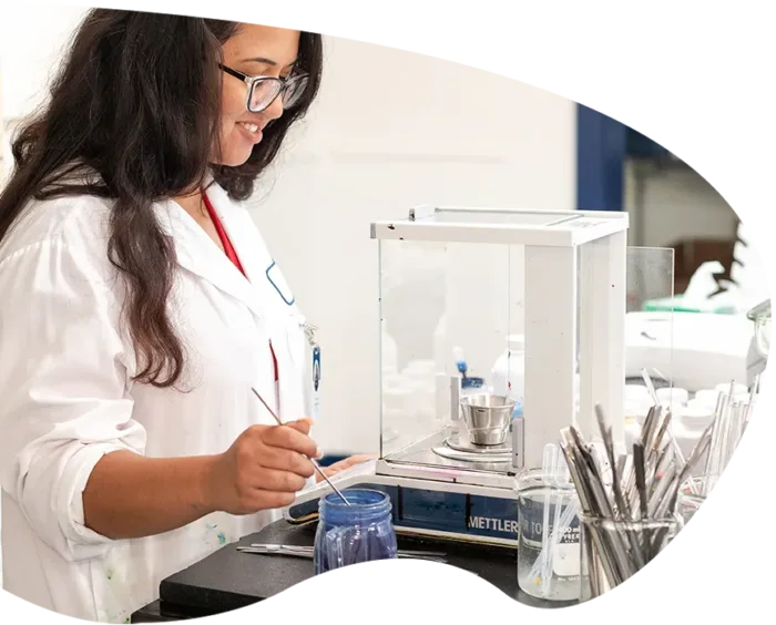 woman in lab working on colors