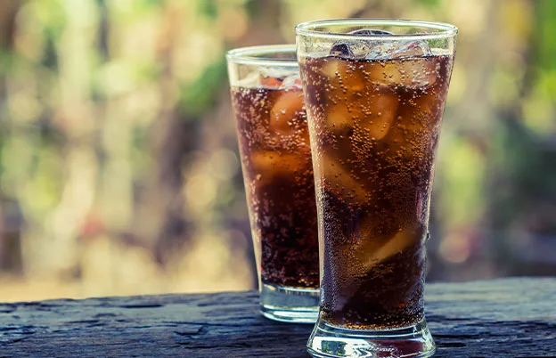 glasses of dark soda