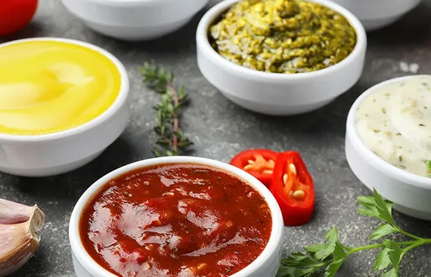 bowls of colourful condiments