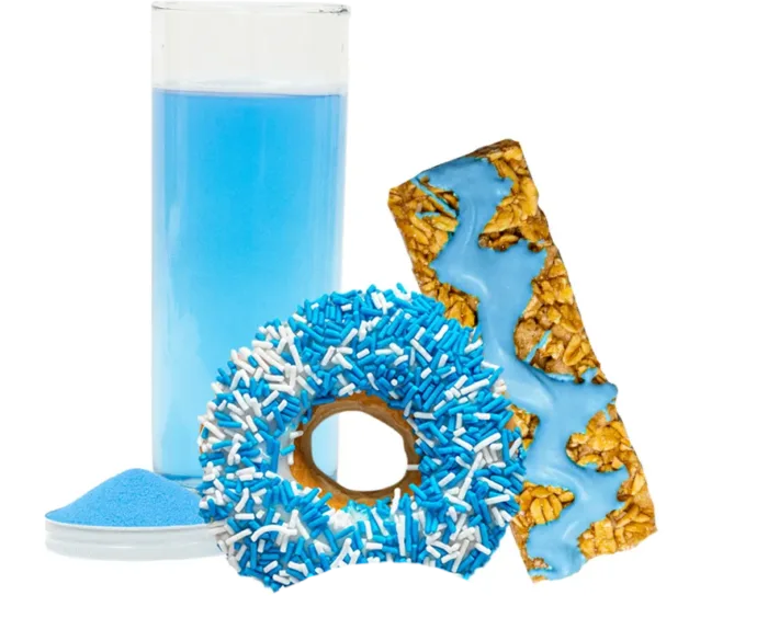 bright blue powdered drink, sprinkles on donuts and frosting on granola bar