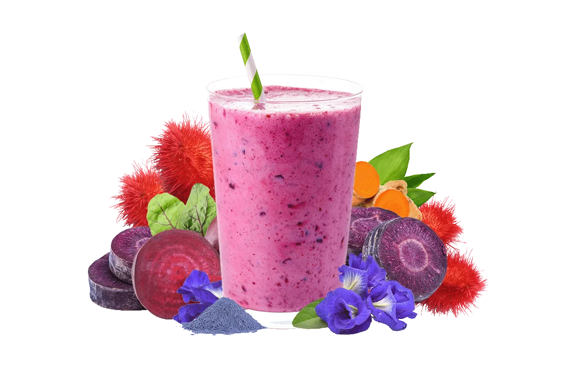 colorful drink surrounded by raw materials