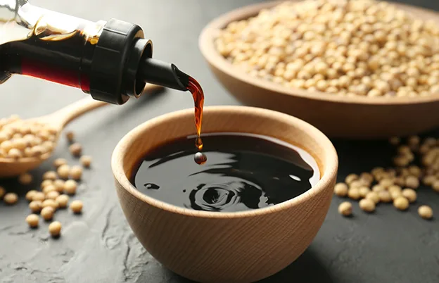 pouring soy sauce