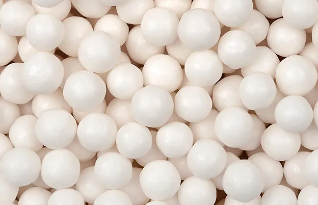 white shelled candy balls