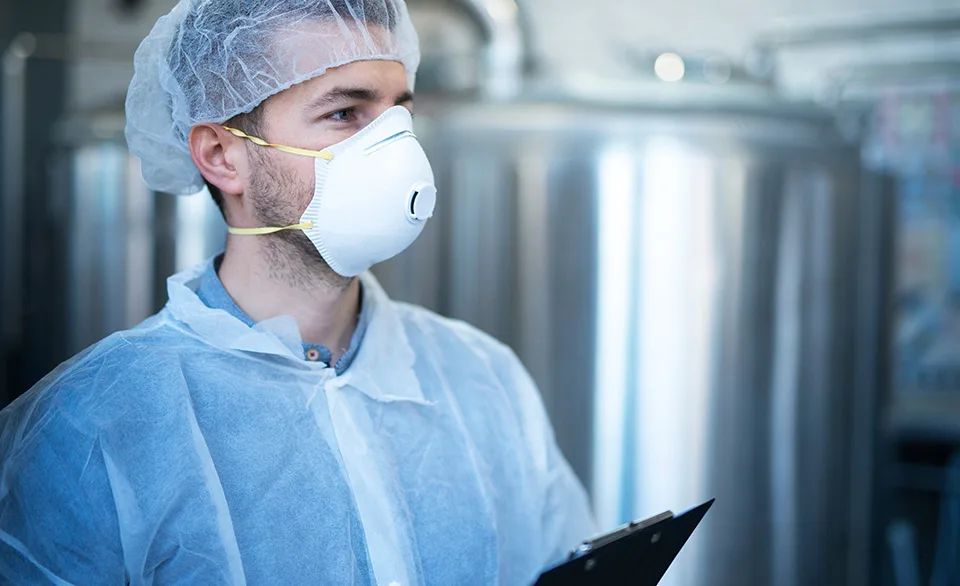 worker checking safety protocol