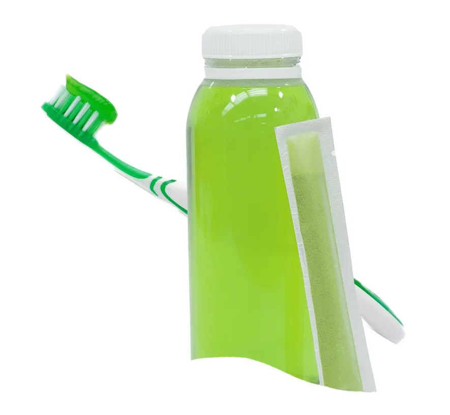 green drink with powder stick and green toothpaste