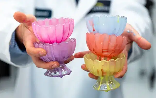 empty ice cream bowls in hands