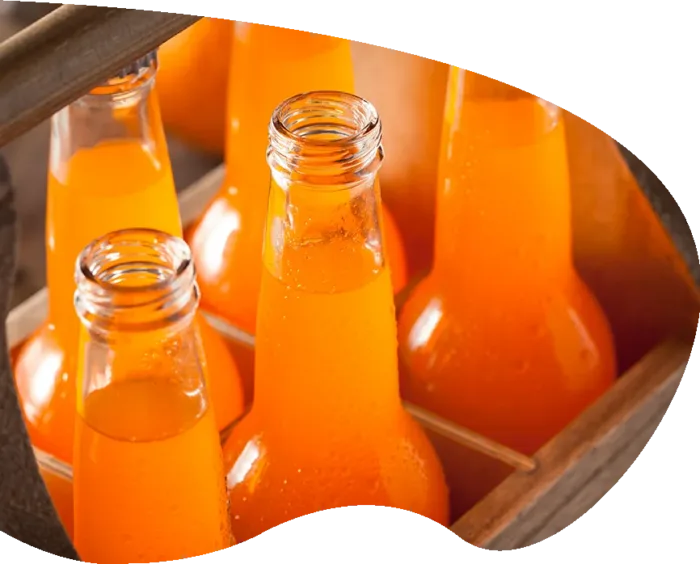 orange soda in glass bottles